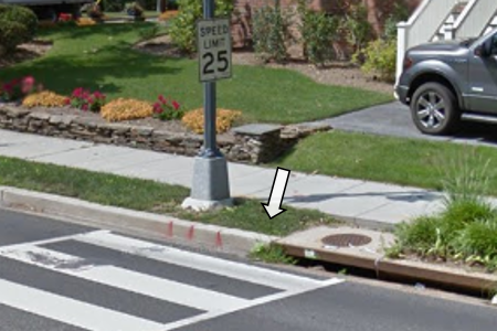 No curb ramp at the end of the crosswalk